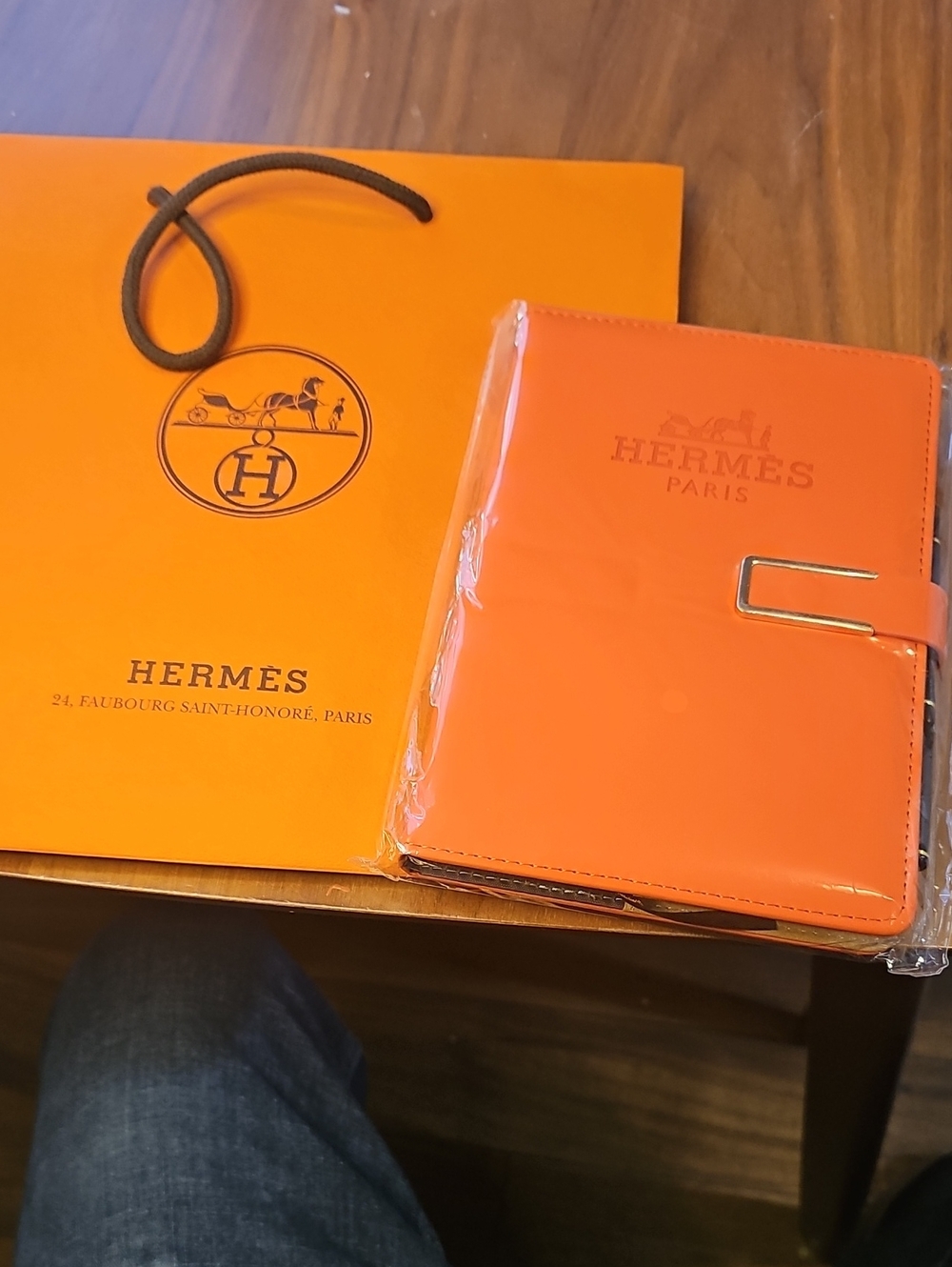 Hermes Orange Leather Notebook With Pen And Gift Bag.